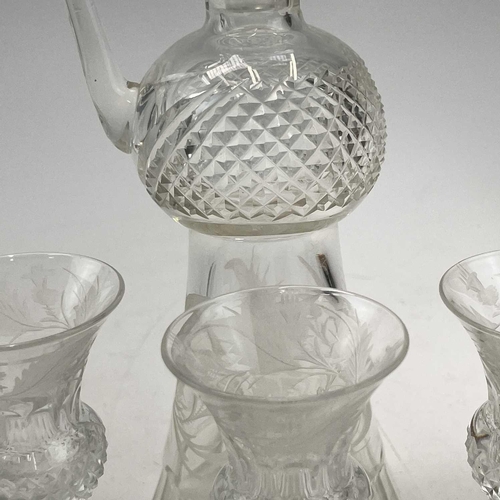 920 - An Edinburgh crystal cut glass tot set, comprising a handled decanter, the stopper incorporating a t... 