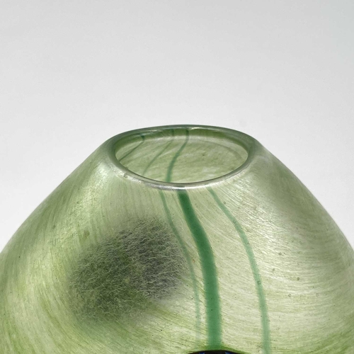 931 - A Norman Stuart Clarke art glass vase, with two iridescent blue roundels on a mottled green ground, ... 