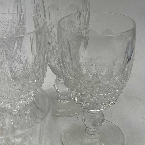 933 - A set of four Waterford crystal champagne flutes, height 15.5cm together wither four Waterford cryst... 