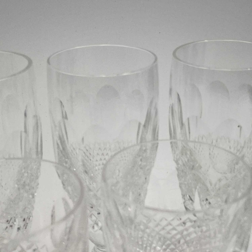 933 - A set of four Waterford crystal champagne flutes, height 15.5cm together wither four Waterford cryst... 