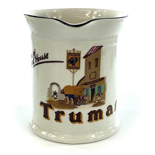 935 - A Royal Doulton pub water jug, advertising Truman's brewery, 'The Sign of a Good House', height 12cm... 