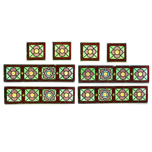 94 - A set of four Edwardian stained glass panels, each with four quatrefoils, 75X18.5cm, together with f... 