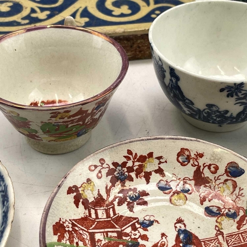 942 - A Caughley blue and white teabowl, circa 1790, printed with the mother and child pattern, diameter 8... 