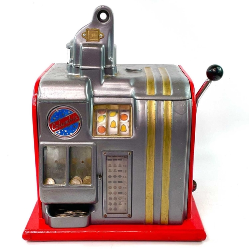 96 - A vintage Columbia table top one armed bandit slot or fruit machine, with later red painted finish, ... 