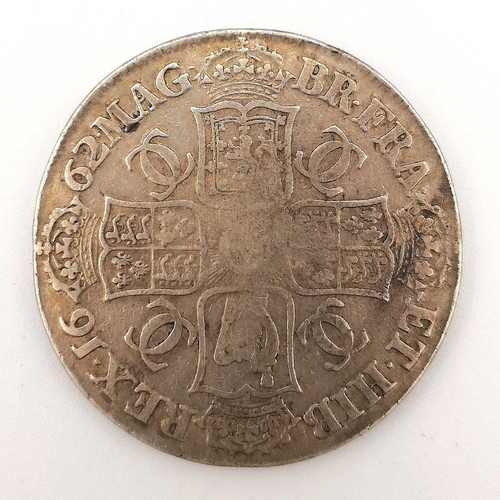 165 - Great Britain Silver Crown Charles II. A cased 1662 silver Crown with rose mint mark.