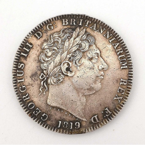 180 - Great Britain Silver Crown George lll. A cased 1819 LIX edged silver crown