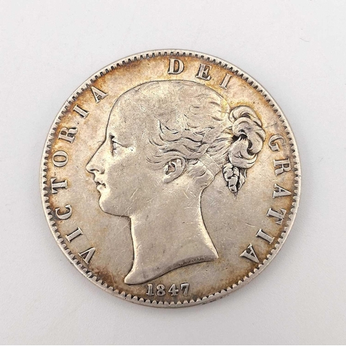 186 - Great Britain Silver Crown Q.Victoria. A cased 1847 silver crown in F grade. Only 140,976 issued