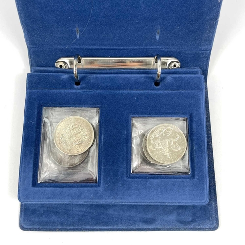 226 - Great Britain Silver Crowns (x10) A blue folder containing 10 silver crowns ranging from 1820, 1821,... 