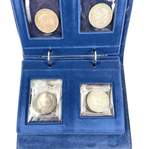 226 - Great Britain Silver Crowns (x10) A blue folder containing 10 silver crowns ranging from 1820, 1821,... 