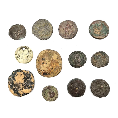 280W - Roman Coins (x12) A mixed lot of 12 coins mostly bronze and in mixed condition but including 4 with ... 