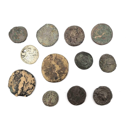 280W - Roman Coins (x12) A mixed lot of 12 coins mostly bronze and in mixed condition but including 4 with ... 