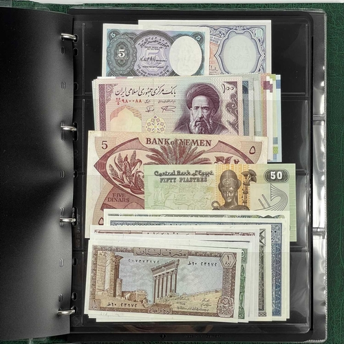 286F - Large Collection of Foreign Banknotes. A green banknote album containing a very large quantity of ba... 