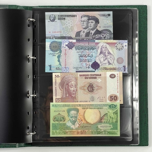 286F - Large Collection of Foreign Banknotes. A green banknote album containing a very large quantity of ba... 