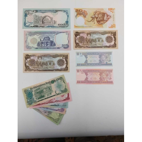 286F - Large Collection of Foreign Banknotes. A green banknote album containing a very large quantity of ba... 