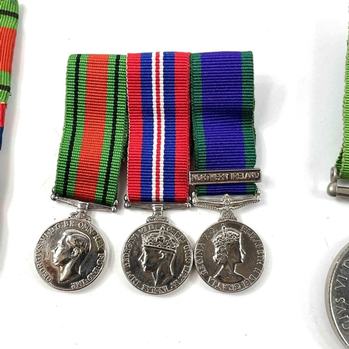 324 - World War 2 & Northern Ireland Medal Group of 3. An unusual group of 3 medals consisting of World Wa... 