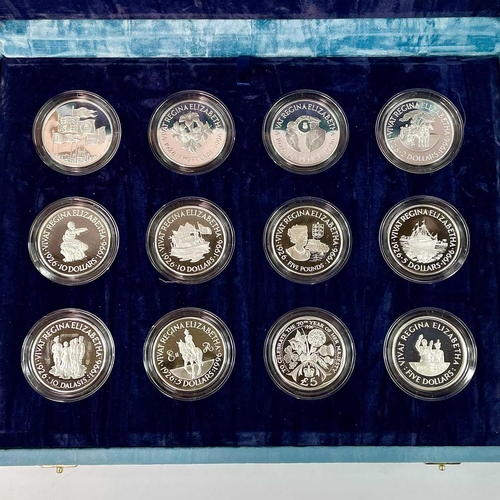 37 - Royal Mint 70th Birthday of HM The Queen Silver Proof £5 coin size coins (x12). Comprising coins fro... 