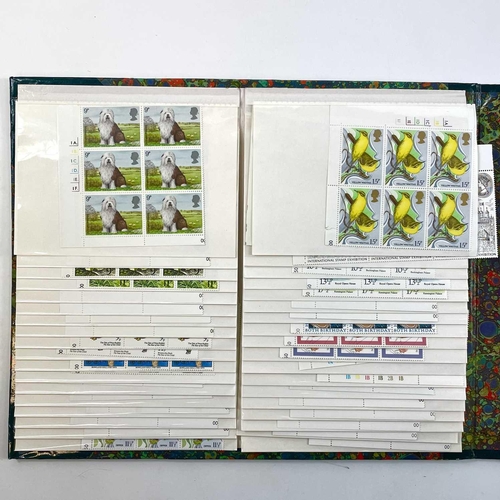 486 - Great Britain Decimal Mint Stamps A box containing a number of folders containing unmounted mint cyl... 