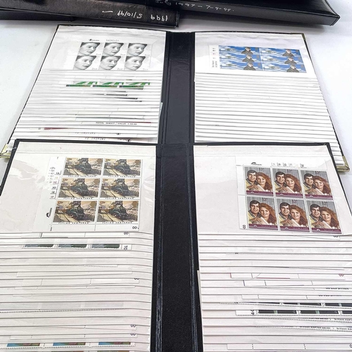 486 - Great Britain Decimal Mint Stamps A box containing a number of folders containing unmounted mint cyl... 