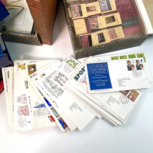 487 - Great Britain & World Stamps. A large box containing various stamps on leaves, in albums, in club bo... 