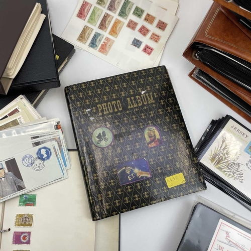 501 - World stamp albums and GB first day cover albums. A large box containing a world collection in four ... 