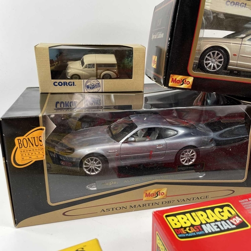 701 - Die Cast Model Vehicles (x12). Box containing boxed: 1: Maisto (x2) 1/18 scale Aston Martin DB7, Jag... 