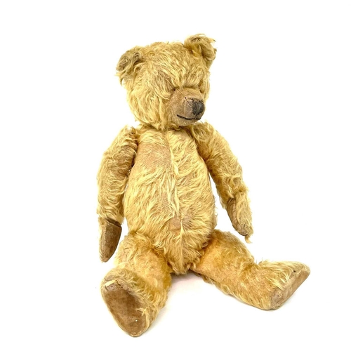 736 - Early to Mid 20th Century Teddy Bear Comprising an articulated plush golden coloured bear (length 42... 