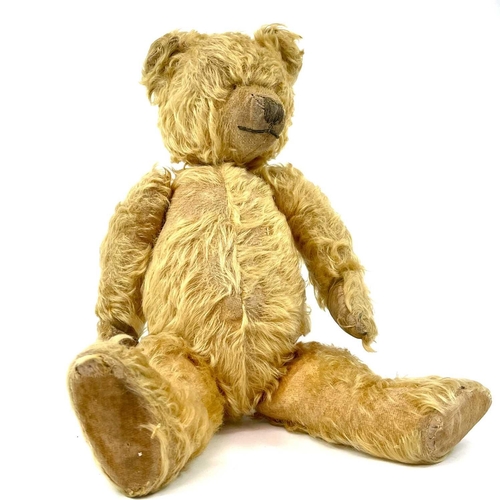 736 - Early to Mid 20th Century Teddy Bear Comprising an articulated plush golden coloured bear (length 42... 