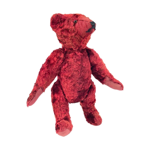 737 - Mid 20th Century Red Plush Teddy Bear. Comprising an articulated plush red bear (length 35cm), possi... 