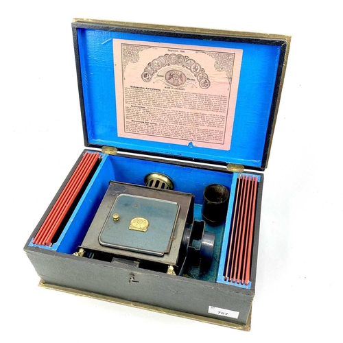 767 - E.P. German 19th Century Tinplate Magic Lantern & Slides in Original Case. Comprising a blue Ernst P... 