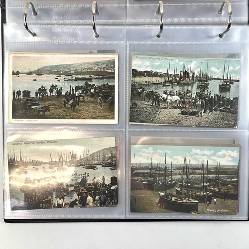 927 - Cornwall Interest: Postcards - Newlyn Modern blue album containing approximately 120 cards of Newlyn... 