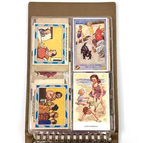 947 - Cigarette Cards, Postcards and Ephemera/. Album containing a quantity of Ogdens guinea gold, Ogdens ... 