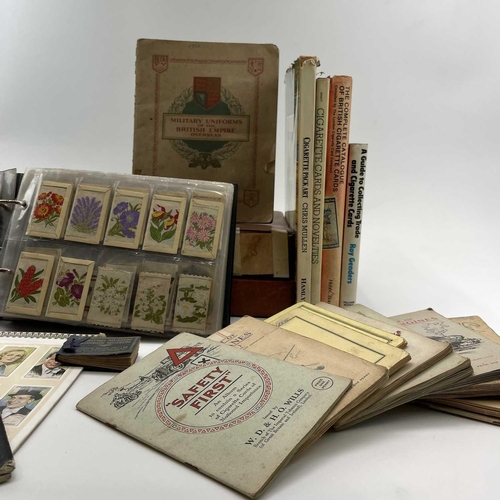 977 - Cigarette & Trade Cards. Large accumulation in a plastic tub which includes 3 albums containing sets... 