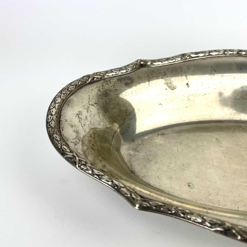 100 - A 19th century German 800 silver oval dish by Strube & Sohn. the rim cast with leaves, stamped 800, ... 