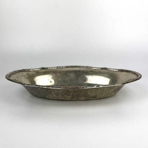 100 - A 19th century German 800 silver oval dish by Strube & Sohn. the rim cast with leaves, stamped 800, ... 