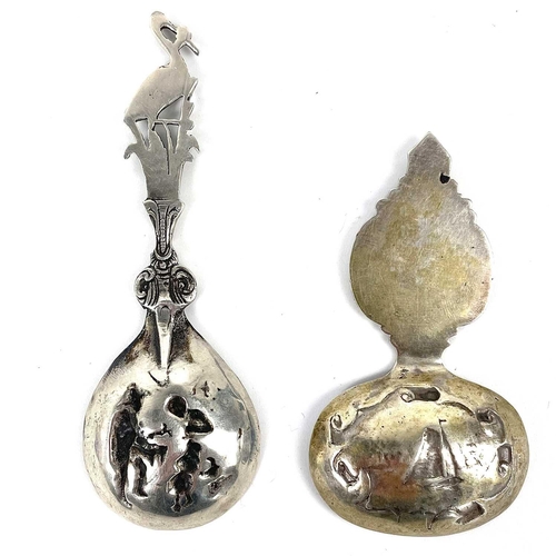 120 - Two Dutch silver tea caddy spoons. With typical cast handles and bowls, 33g.