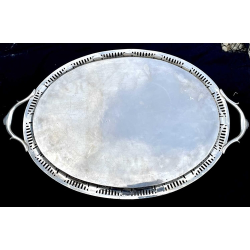 23 - An impressive Georgian style silver Neo-Classical large oval twin handled tea tray The beaded edge c... 