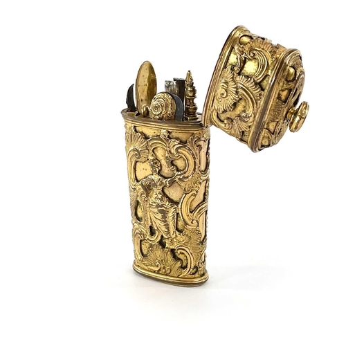 314 - A late 18th century Ormolu etui with six fitted implements The case with hinged lid and with applied... 