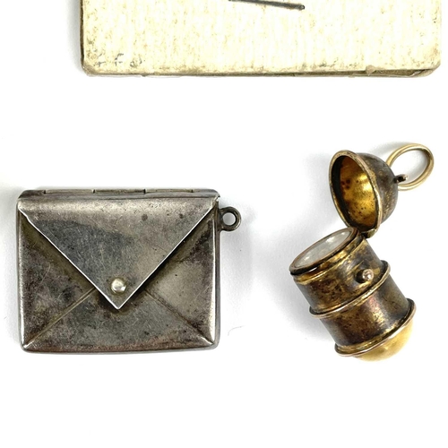 316 - A collection of small items. To include an Edwardian silver envelope stamp holder, Birmingham 1902, ... 