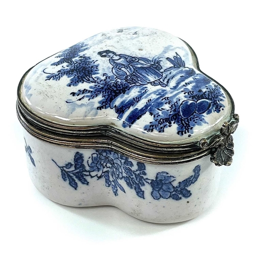 324 - A 19th century blue and white tin glazed lobed hinge lidded box The white metal rims with scallop sh... 