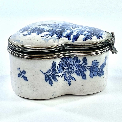 324 - A 19th century blue and white tin glazed lobed hinge lidded box The white metal rims with scallop sh... 