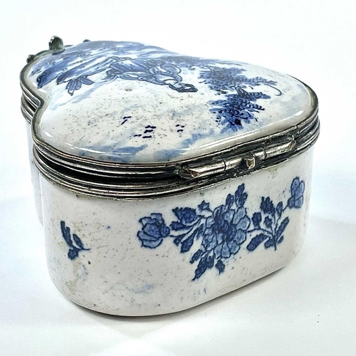 324 - A 19th century blue and white tin glazed lobed hinge lidded box The white metal rims with scallop sh... 