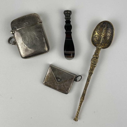 329 - A small selection of items. Including a George V silver vesta case hallmarked Birmingham 1919; An Ed... 