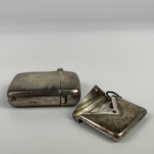 329 - A small selection of items. Including a George V silver vesta case hallmarked Birmingham 1919; An Ed... 