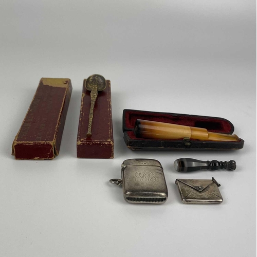 329 - A small selection of items. Including a George V silver vesta case hallmarked Birmingham 1919; An Ed... 