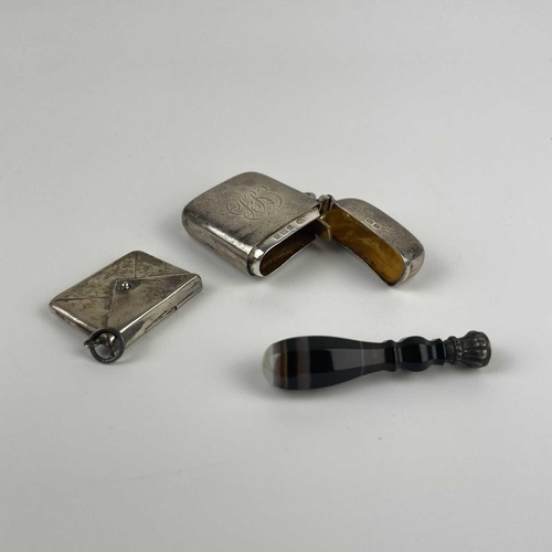 329 - A small selection of items. Including a George V silver vesta case hallmarked Birmingham 1919; An Ed... 