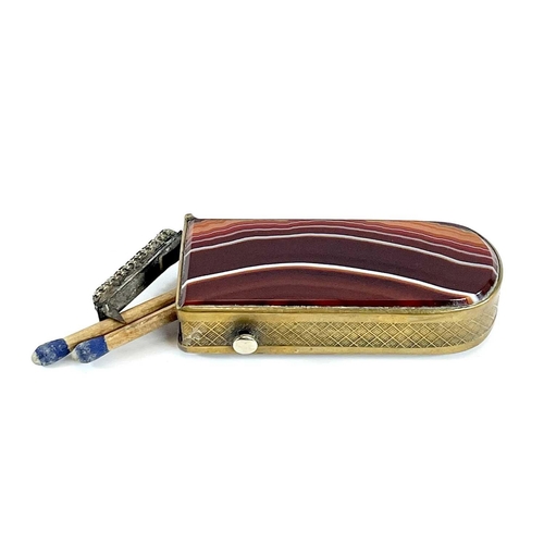 332 - A banded agate and brass vesta case. Length 7cm.