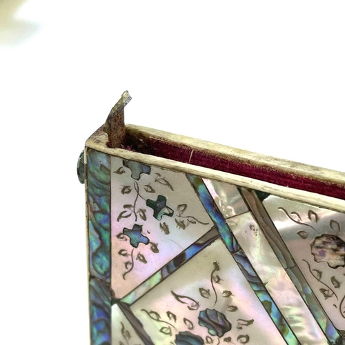 333 - A 19th century mother of pearl and abalone calling card case. Length 10cm.There is a missing section... 