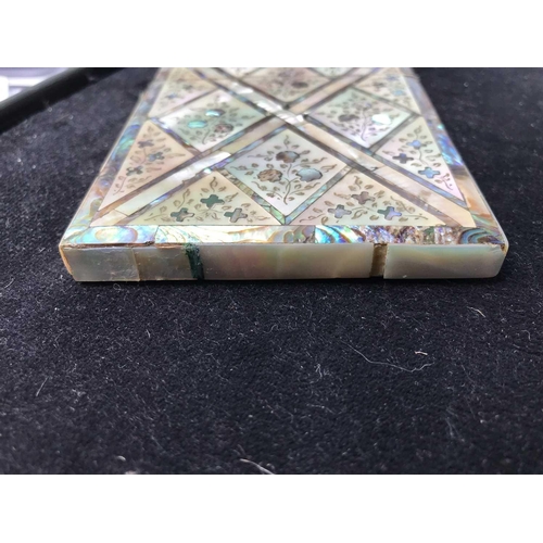 333 - A 19th century mother of pearl and abalone calling card case. Length 10cm.There is a missing section... 