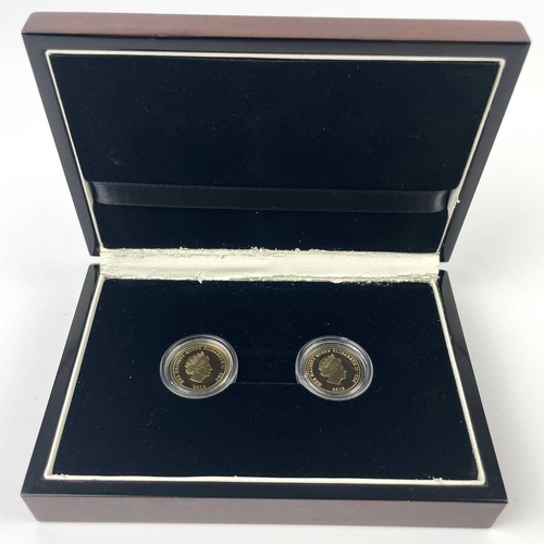 335 - A cased set of two 2013 and 2014 full sovereign coins. Commemorating the birth of Prince George and ... 