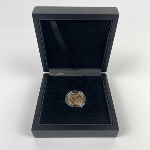 337 - An Edward VII 1902 full sovereign coin. Box and The London Mint Office certificate.